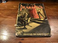 Front cover showing title, artwork, spine damage