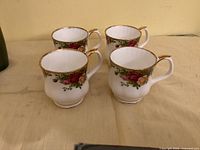 Four Royal Albert Old Country Roses Montrose mugs front view