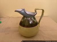 Side view of Royal Bayreuth pitcher showing sheep scene, color gradient and handle