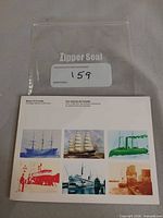 Front view of Ships of Canada Heritage Stamp Collection booklet and storage bag
