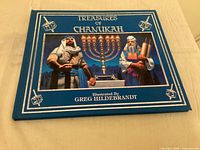 Front view of Treasures of Chanukah hardcover book