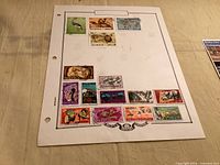 Full album page with all 15 stamps visible