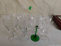 All nine assorted glasses grouped together