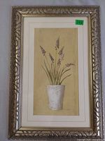 Full view of framed wall art showing grape hyacinth print, mat, and ornate frame