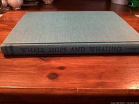 Spine and cover of blue cloth hardcover Whale Ships and Whaling