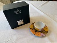cup, saucer and box full view