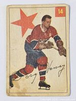 Front of 1954-55 Parkhurst card showing Montreal Canadiens player, card number 14, visible crease and wear