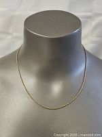 Full view of necklace on display bust