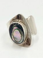 Front view showing abalone cabochon and silver setting