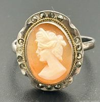 Front view of shell cameo and marcasite silver ring