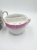 Shaving scuttle cup showing pink band, shelf and handle