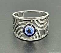 front view showing evil eye inset and cut-out band pattern