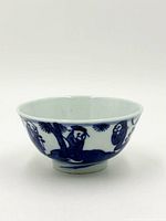 side view showing blue and white figure decoration