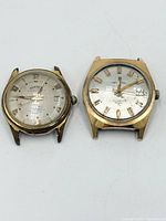 Front view of both wristwatches showing dials