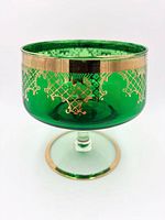 front view showing green bowl, gold decoration, clear stem/base