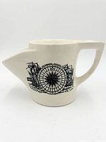 Front view showing compass and ships graphic