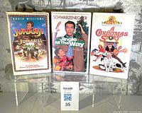 Front covers of all three VHS tapes