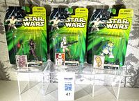 Front view of three sealed Star Wars Sneak Preview figures on cards