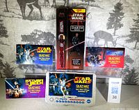 All items: Quiz Wiz console, four Star Wars Quiz Wiz books, sealed Darth Maul watch