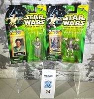 Front of Shmi Skywalker and Sebulba carded figures
