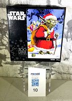 Front of sealed Star Wars Yoda Santa Suit 300-piece puzzle box