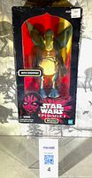 Front view of sealed Watto figure in Episode I box