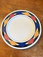 Top view of plate showing full geometric rim design and color scheme