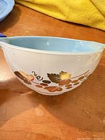 Side view showing blue interior and gold grapevine decal