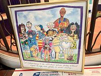 Front view of framed cartoon cat print