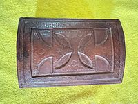 Top view showing carved leaf motif and overall finish
