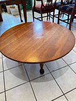 Full view of round coffee table top and legs