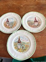 Front view of the three vineyard motif plates