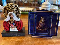 Both figurine and ashtray side by side showing overall form and scale
