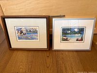 Both framed prints side by side showing overall size and frames