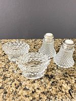 All four pieces: two open salts and two shakers