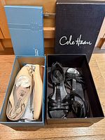 Both shoe pairs in original boxes