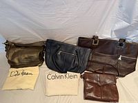 Front view of all four bags and two dust covers
