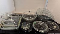 Group shot of all Pyrex and Fire-King glass bakeware and lids