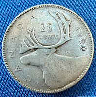 Reverse of 1950 Canadian 25-cent coin showing caribou design