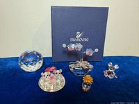 Group shot showing all five Swarovski crystal items and box