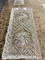 Rectangular cut glass tray with smaller square dish visible
