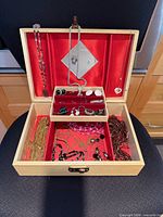 Overall view of jewelry box open showing contents