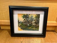 Full view of framed painting