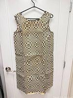 Front view of Paper Caper dress showing full pattern and silhouette