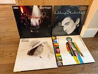 Front covers of four representative records: ABBA Super Trouper, k.d. lang Shadowland, Rita self-titled, Leo Sayer Cool Touch