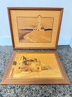Both framed wood inlay pictures displayed together
