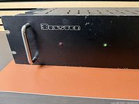 Front left view of Bryston 3B amplifier showing logo, handle and LED indicators