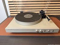 Full view of Harman/Kardon T40 turntable with dust cover open