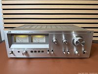 Front angled view of JVC JA-S22 showing entire façade and top ventilation