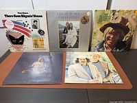 Front covers of all five LP jackets